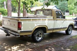 Red 1981 Ford F100 Custom short bed with factory 5-slot wheels, an entrant in the 2020 Virtual Truck Show.