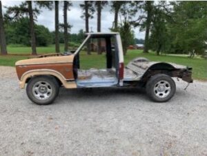 1982 Ford F150 Explorer regular cab with a silver tool box in the bed, nicknamed Rosebud, an entrant in the 2020 Virtual Truck Show.