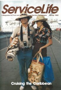 A scanned magazine cover titled "ServiceLife" featuring a couple on a cruise ship and an advertisement for Motorcraft high-performance racing oil filters and spark plugs.