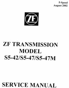 An exploded view of a ZF5 manual transmission highlighting the aluminum housing, internal gear set, and the rear mounting flange.