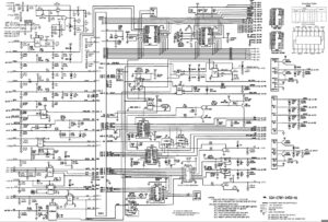Complex circuit board schematic for a Ford truck Electronic Control Assembly showing processors, capacitors, and pinouts.