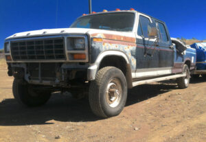 Blue and white 1986 Ford F350 crew cab short bed with a 7.3 IDI diesel engine, an entrant in the 2020 Virtual Truck Show.