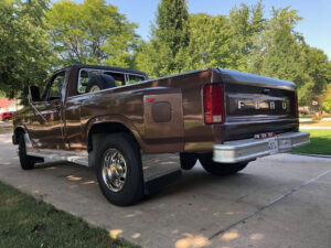 A brown 1983 Ford F350 Custom 2WD single cab dually with a 460 V8 and manual transmission, featured in the 2020 Virtual Truck Show.