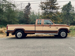 A 1986 Ford F250HD regular cab with a 460 V8 engine and original light-colored paint, featured as Entrant #35 in the 2020 Virtual Truck Show.