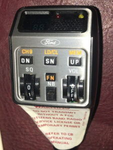 Parts list and installation diagram for the Ford 40-channel CB radio showing the chassis mount and microphone-mounted controls.