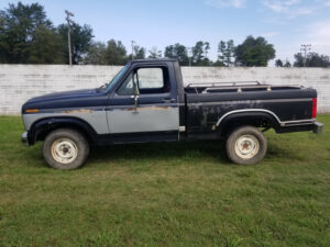 A 1982 Ford F100 Custom short bed, a daily driver with mixed bodywork from a donor truck, featured as Entrant #32 in the 2020 Virtual Truck Show.